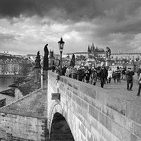 Buy canvas prints of on the Charles Bridge under a stormy sky in Prague by Julie Woodhouse