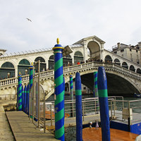 Buy canvas prints of Rialto Bridge Venice Italy by John Keates