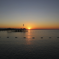 Buy canvas prints of Sunrise at Lara Beach Turkey by John Atkins