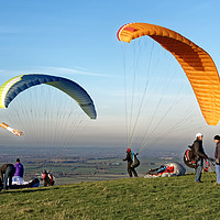 Buy canvas prints of Paragliders, Westbury White Horse, Wiltshire, UK by Andrew Harker