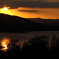 Buy canvas prints of Loch Lomond Sunset by Alan Baird