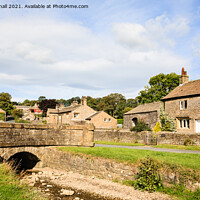 Buy canvas prints of Downham Village and Beck in Lancashire by Pearl Bucknall