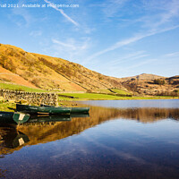 Buy canvas prints of Reflections in Watendlath Tarn in Lake District by Pearl Bucknall