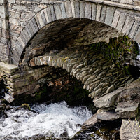 Buy canvas prints of Hidden Packhorse Bridge Snowdonia Wales by Pearl Bucknall