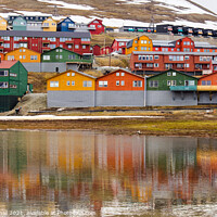 Buy canvas prints of Colourful Longyearbyen Reflected Svalbard by Pearl Bucknall