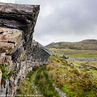 Buy canvas prints of Overhanging Wall in Cwmystradllyn Snowdonia by Pearl Bucknall