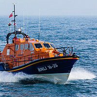 Buy canvas prints of Moelfre RNLI Lifeboat at Sea off Anglesey by Pearl Bucknall