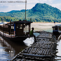 Buy canvas prints of Mekong River Boat Laos by Pearl Bucknall