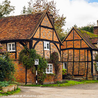 Buy canvas prints of Period Cottages in English Village by Pearl Bucknall