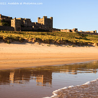 Buy canvas prints of Bamburgh Castle Reflected Northumberland coast by Pearl Bucknall