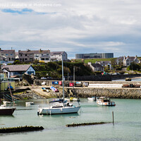 Buy canvas prints of Cemaes Village Harbour Anglesey Wales by Pearl Bucknall