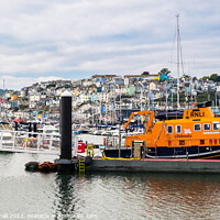 Buy canvas prints of RNLI Lifeboat Brixham Harbour Devon Coast by Pearl Bucknall