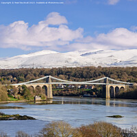 Buy canvas prints of Menai Bridge and Mountains from Anglesey by Pearl Bucknall