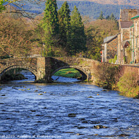 Buy canvas prints of Beddgelert Village Bridge in Snowdonia by Pearl Bucknall