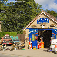 Buy canvas prints of Aidensfield Village Garage from Heartbeat by Pearl Bucknall