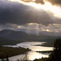 Buy canvas prints of Storm clouds over Loch Garry by Pearl Bucknall