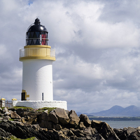 Buy canvas prints of Port Charlotte Lighthouse Islay by Pearl Bucknall