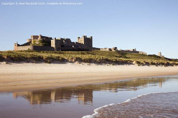 Bamburgh Castle Reflected on Beach Picture Board by Pearl Bucknall