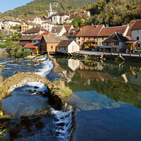 Buy canvas prints of Picturesque River Loue in Lods France by Pearl Bucknall
