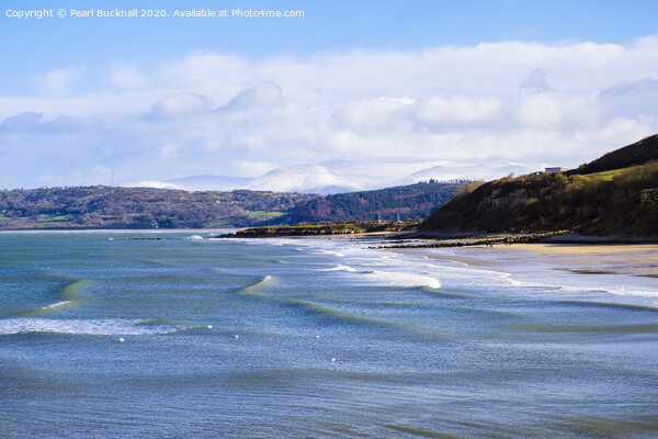 Benllech Beach Anglesey and Snowy Mountains Picture Board by Pearl Bucknall