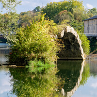 Buy canvas prints of Pont Roman Reflections in Doubs River by Pearl Bucknall