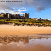 Buy canvas prints of Bamburgh Castle Reflected on Northumberland Coast by Pearl Bucknall