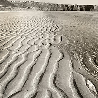 Buy canvas prints of Sand patterns beach, Rhossili village, Gower, UK by Bernd Tschakert