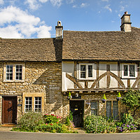 Buy canvas prints of The Old Court House, Castle Combe village, England by Bernd Tschakert