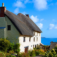Buy canvas prints of thatched cottage cornwall, england by Kevin Britland