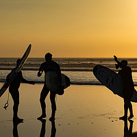 Buy canvas prints of Surfers at sunset by Kevin Britland