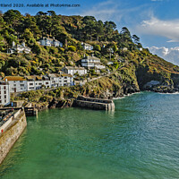 Buy canvas prints of the harbour entrance at polperro in cornwall by Kevin Britland