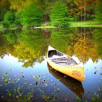 Buy canvas prints of canoe  on the water by Daniel Kesh