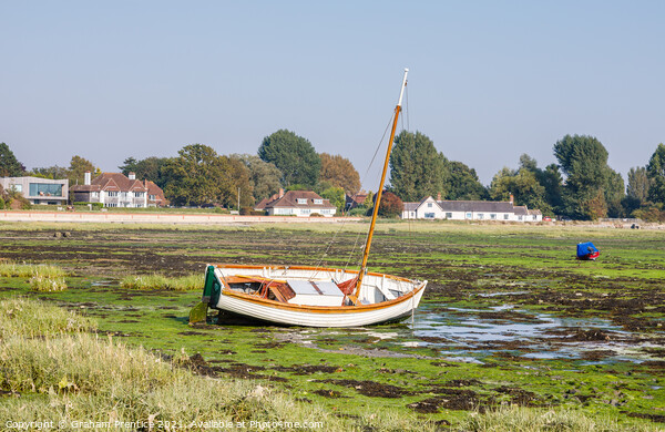 Bosham, Chichester Harbour at Low Tide Picture Board by Graham Prentice