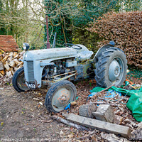 Buy canvas prints of Dilapidated Old Tractor by Graham Prentice