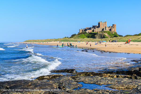 Bamburgh Castle, Beach, Sand and Sea Picture Board by Graham Prentice