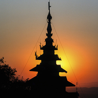 Buy canvas prints of Mandalay Hill Temple At Sunset by Graham Prentice