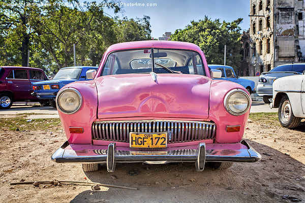  A Very Pink Classic Vintage Car In Havana, Cuba Picture Board by Graham Prentice