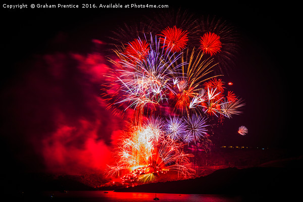 Spectacular fireworks over Santorini Picture Board by Graham Prentice