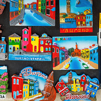 Buy canvas prints of Burano Painted Buildings Souvenirs by Graham Prentice
