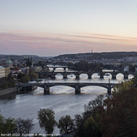 Buy canvas prints of Prague Bridges at Sunset by John Barratt