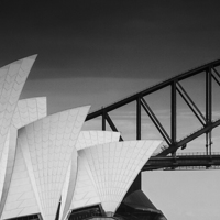 Buy canvas prints of Sydney Opera House with bridge backdrop in mono by Sheila Smart