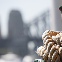 Buy canvas prints of Ropes on Manly ferry with Harbour Bridge backdrop by Sheila Smart