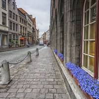 Buy canvas prints of Cobbled street in Brugge by Sheila Smart