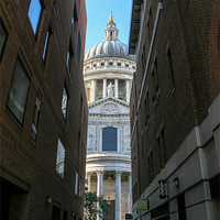 Buy canvas prints of St Pauls Cathedral through an alley by Diane Griffiths