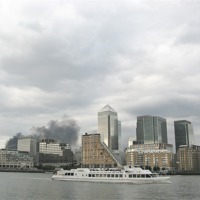 Buy canvas prints of Smoke at Canary Wharf by Diane Griffiths