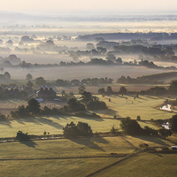 Buy canvas prints of Kent Countryside Misty Sunrise by Diane Griffiths