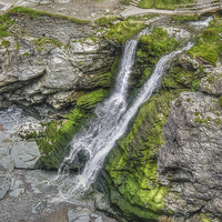 Buy canvas prints of Waterfall at Tintagel by Diane Griffiths