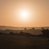 Buy canvas prints of Sunrise over the countryside at Carlyon Bay by Diane Griffiths