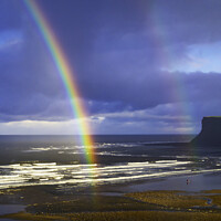 Buy canvas prints of Saltburn Beach  in winter sunshine blue sky  with a double rainbow and a  distant view of looking towards Warsett hill  by Peter Jordan