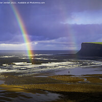 Buy canvas prints of Saltburn Beach  in winter sunshine blue sky  with a double rainbow and a  distant view of looking towards Warsett hill  by Peter Jordan